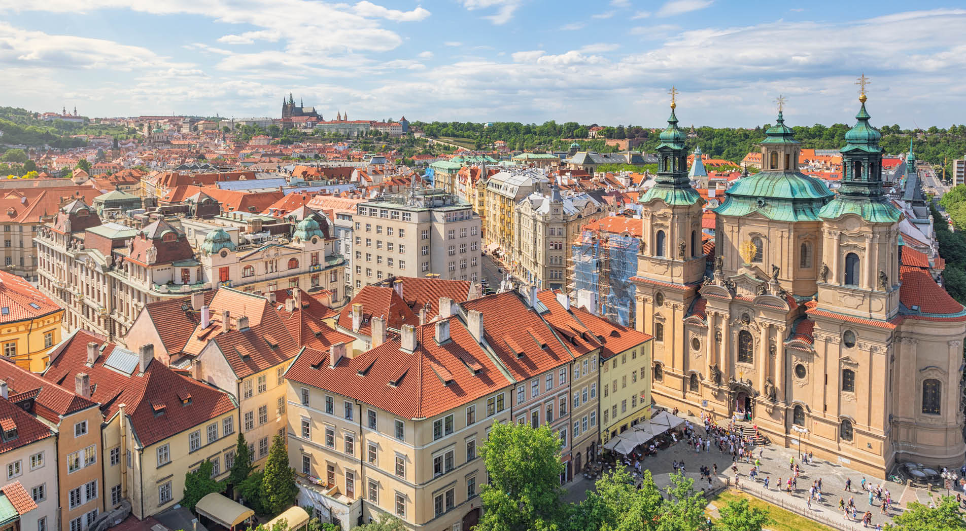 View over central Prague, old town (Stare Mesto) district. On the right is St Nicholas Church, completed in 1737.