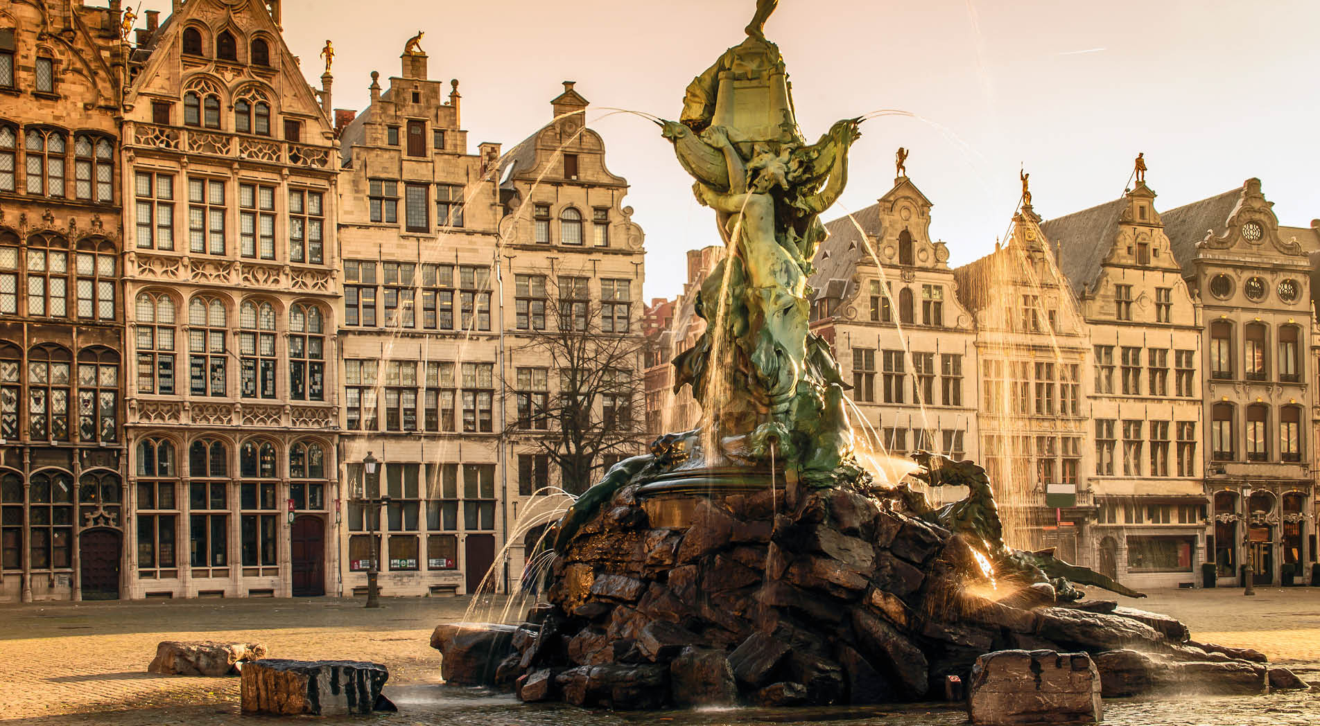 Brabo fountain in front of the town hall on the Great Market Square of Antwerp, Belgium
