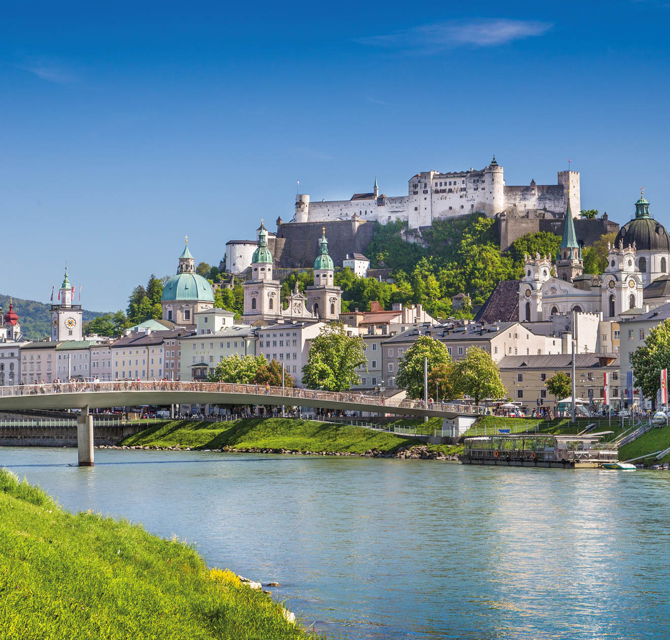 Beautiful view of Salzburg skyline with Festung Hohensalzburg and Salzach river in summer, Salzburg, Salzburger Land, Austria