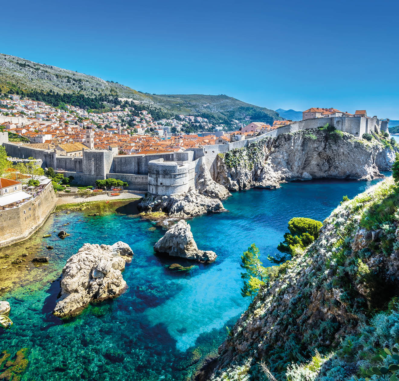 Aerial panoramic view at famous european travel destination, Dubrovnik cityscape on Adriatic Coast, Croatia.