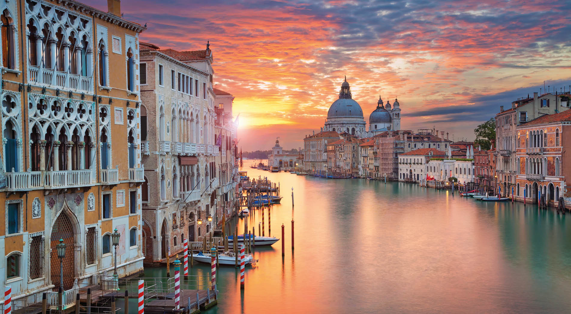 Image of Grand Canal in Venice, with Santa Maria della Salute Basilica in the background.