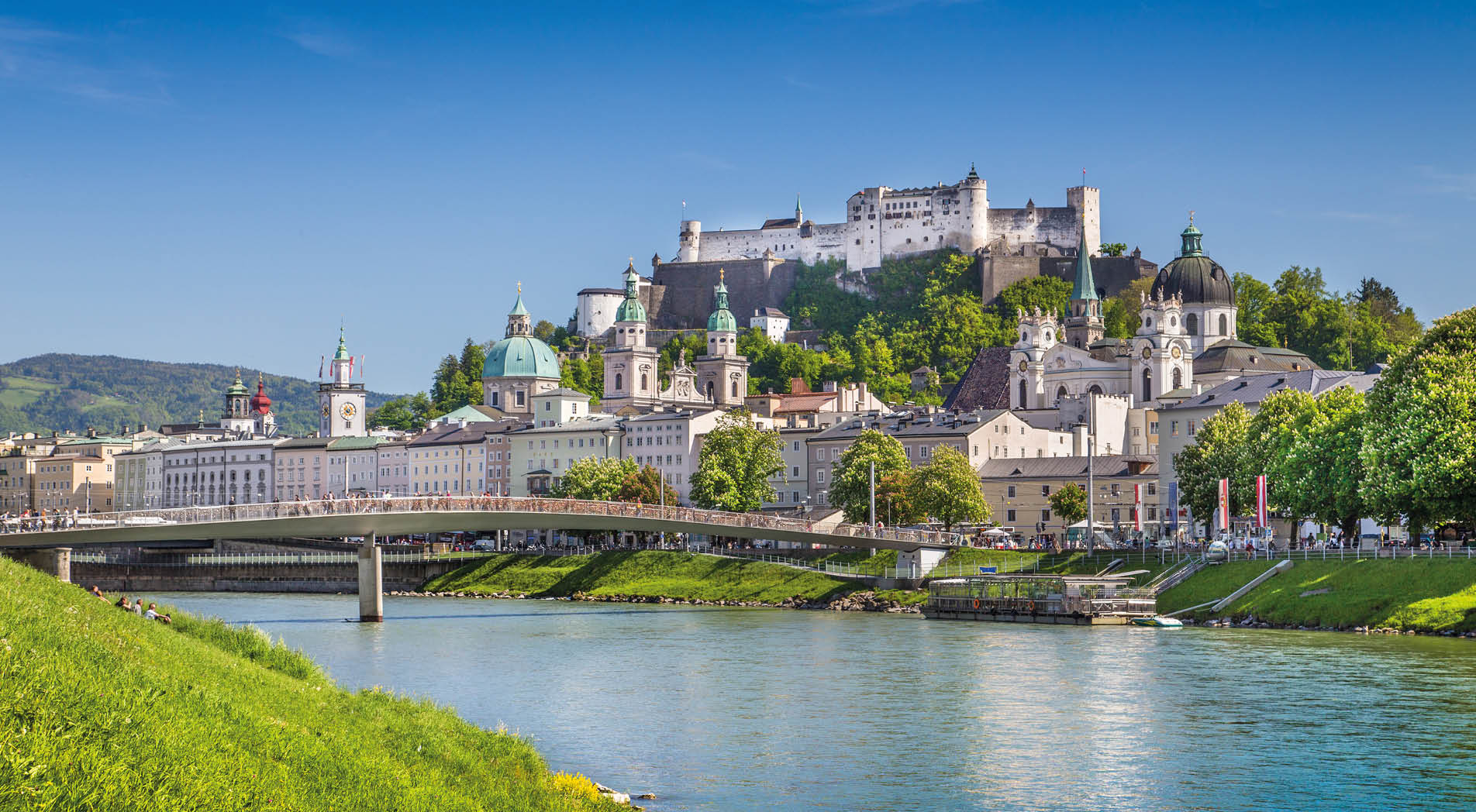 Beautiful view of Salzburg skyline with Festung Hohensalzburg and Salzach river in summer, Salzburg, Salzburger Land, Austria