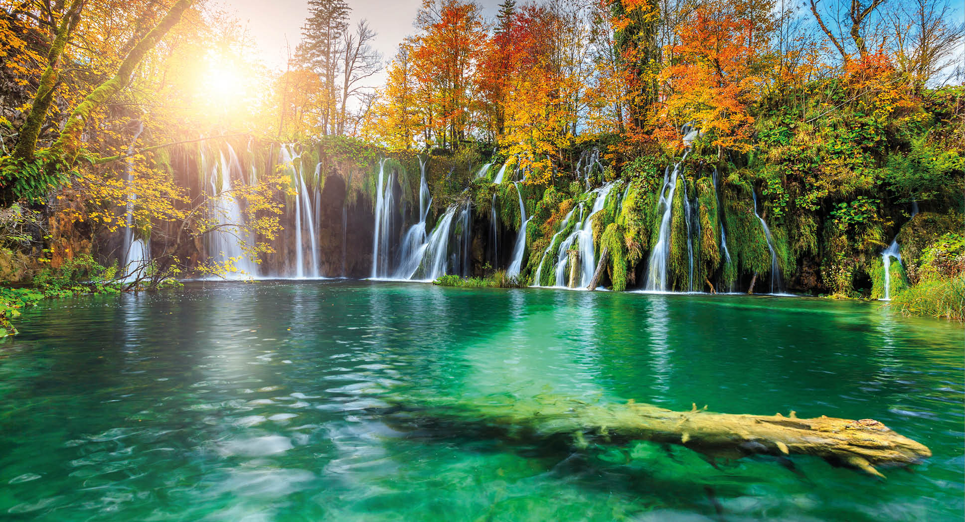 Stunning colorful autumn landscape with spectacular lake and waterfalls in Plitvice lakes National Park, Croatia, Europe