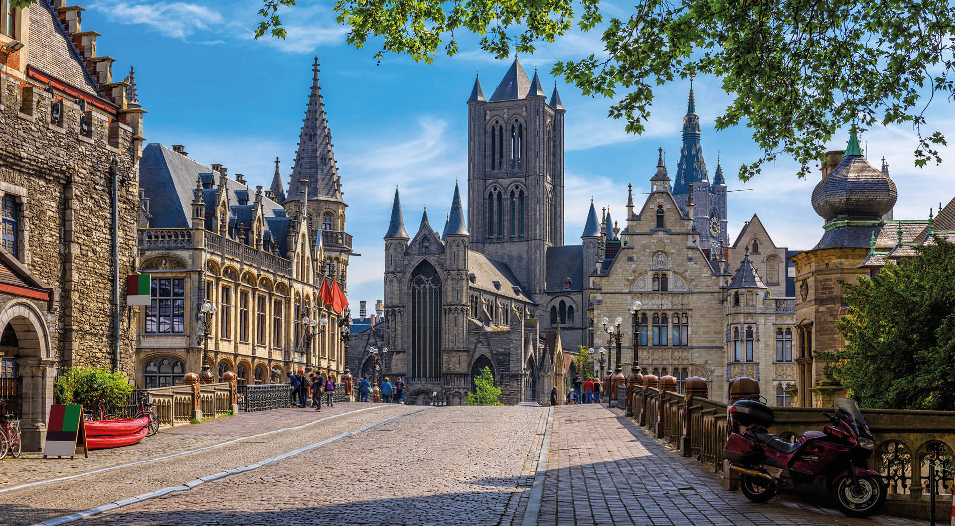 Medieval city of Gent (Ghent) in Flanders with Saint Nicholas Church and Gent Town Hall, Belgium. Cityscape of Ghent.