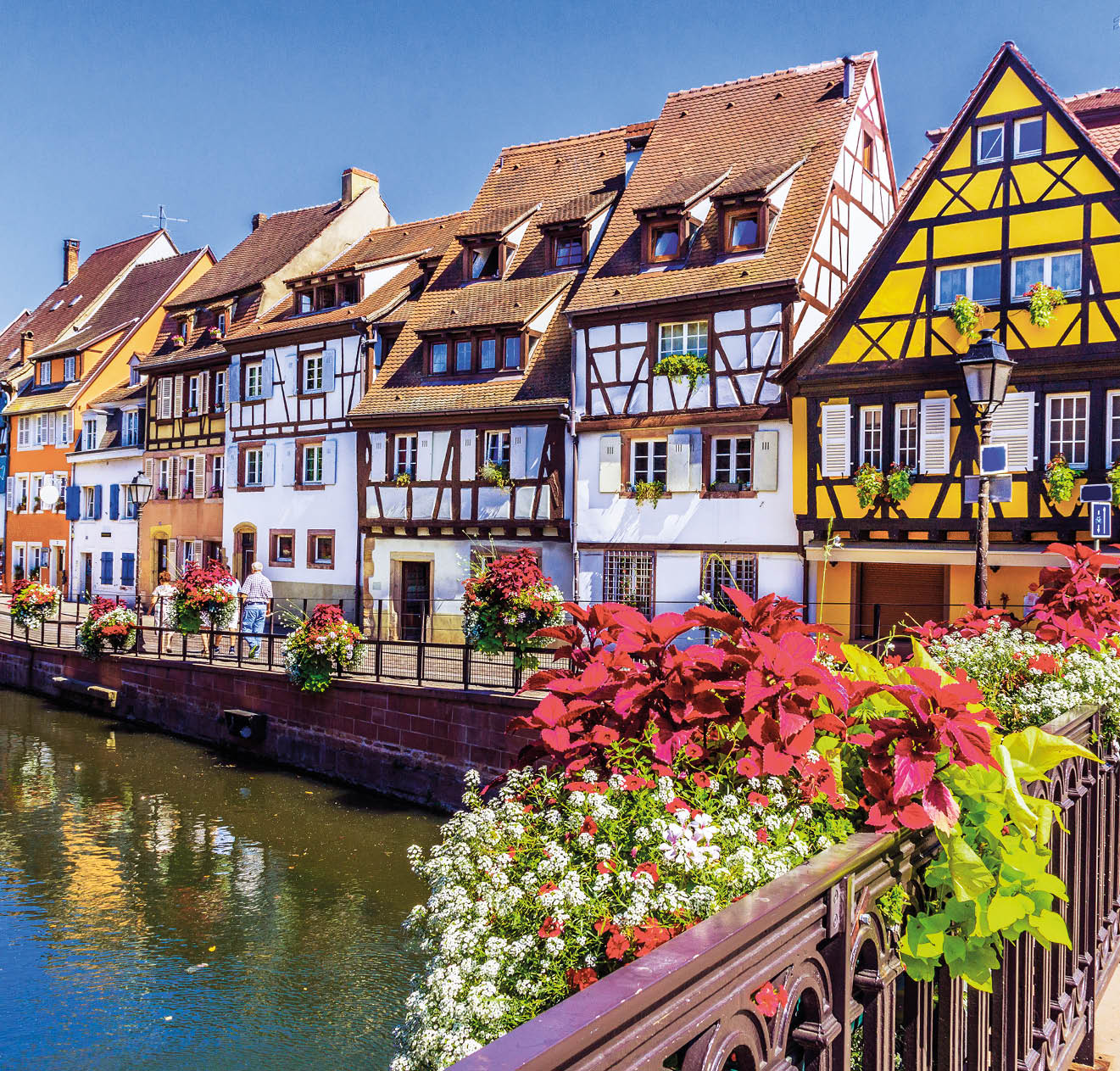 Colmar, Alsace, France. Petit Venice, water canal and traditional half timbered houses.