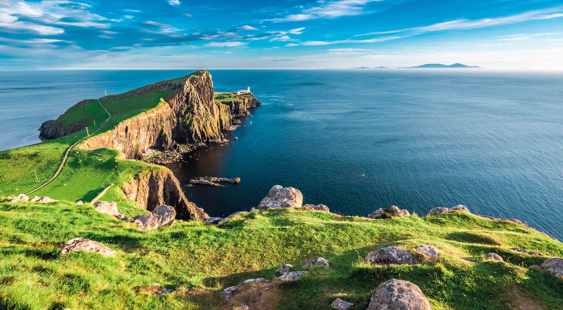 Stunning dusk at the Neist point lighthouse in Isle of Skye, Scotland