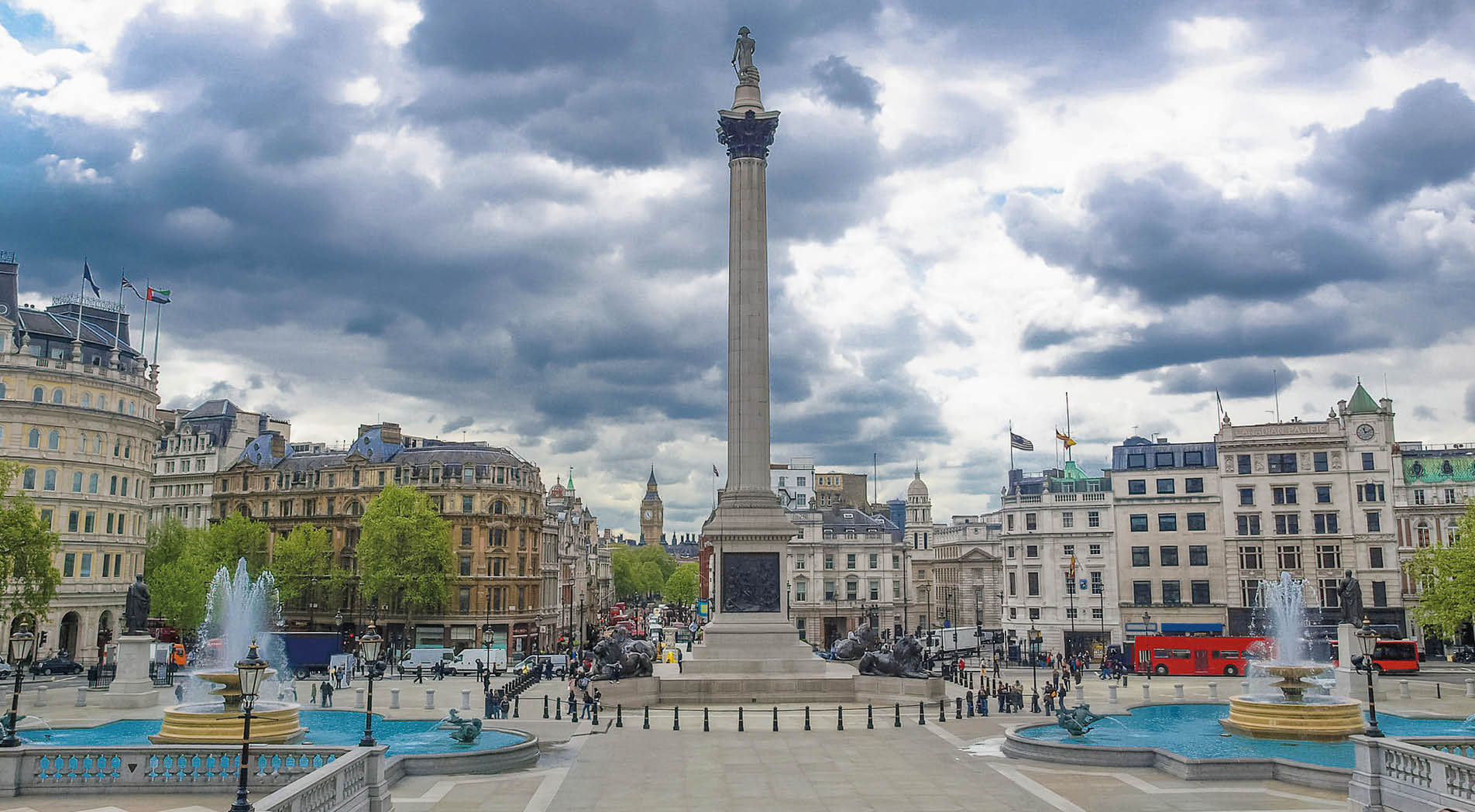 View of Trafalgar Square in London from the National Gallery porch, with unrecognisable crowd