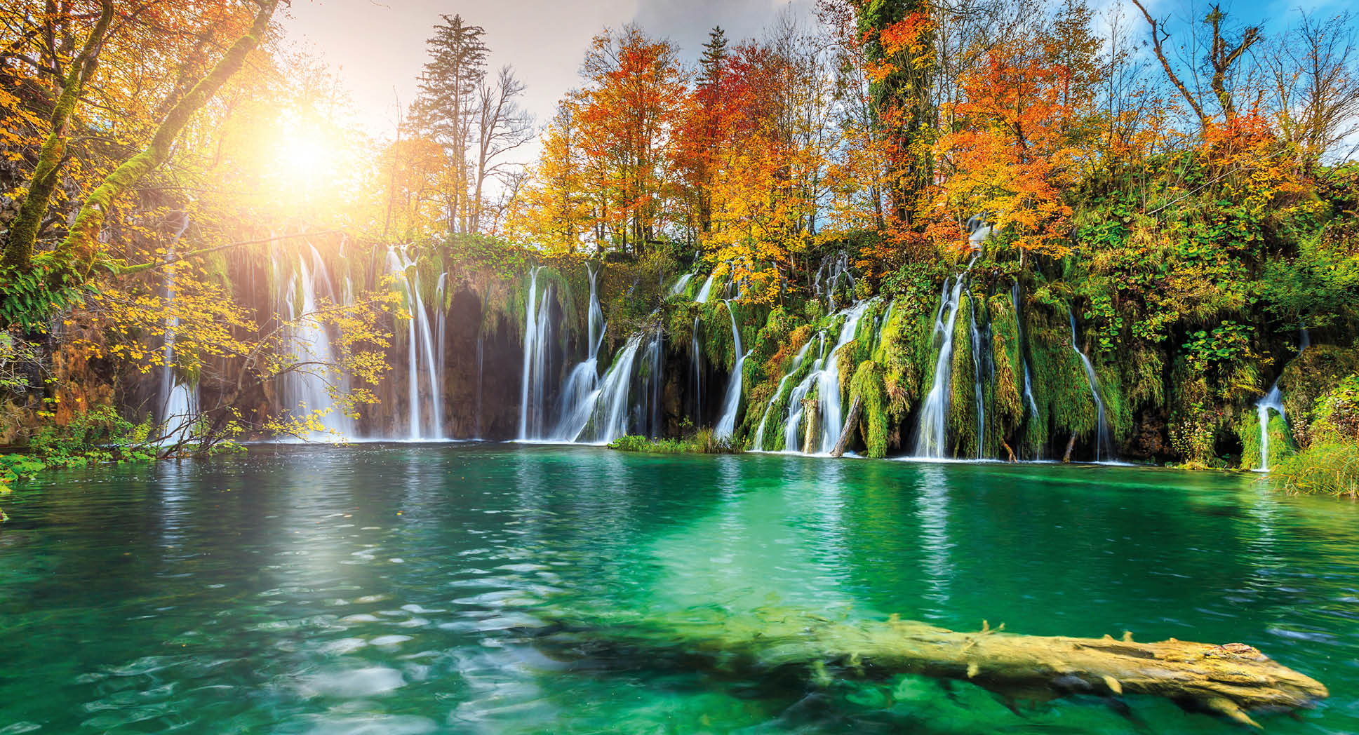 Stunning colorful autumn landscape with spectacular lake and waterfalls in Plitvice lakes National Park, Croatia, Europe