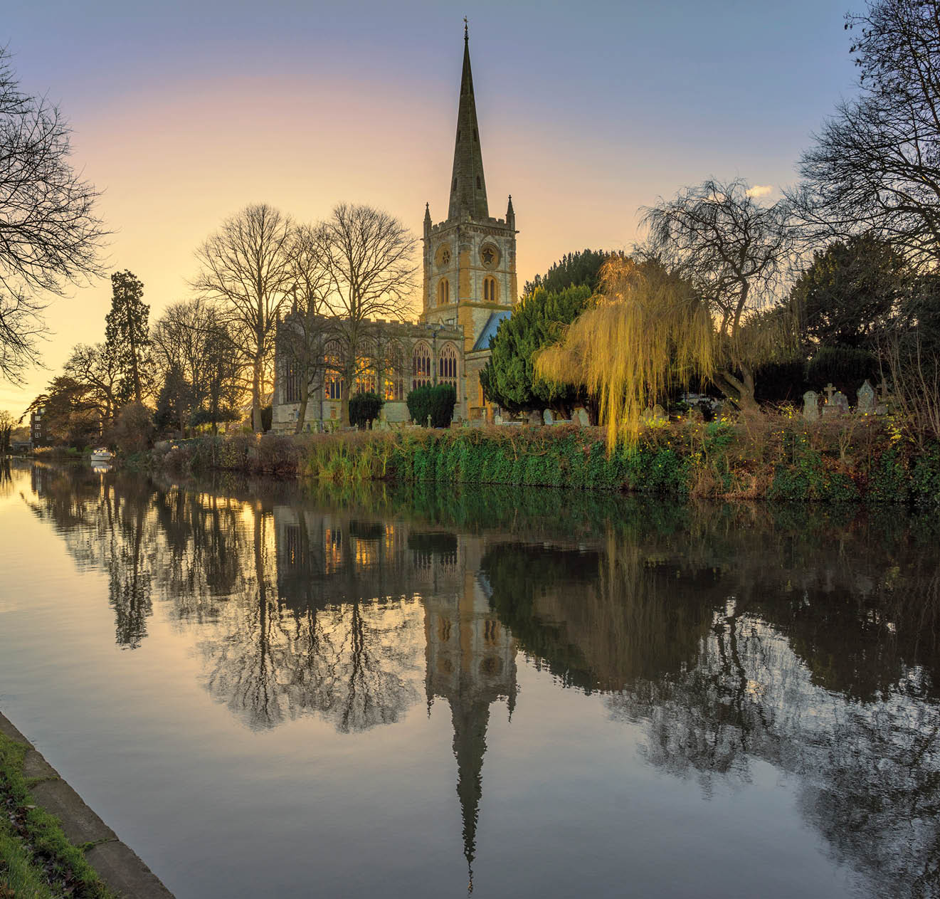 shakespeares burial place holy trinity church stratford-upon-avon warwickshire the midlands england uk. reflections in the river avon.