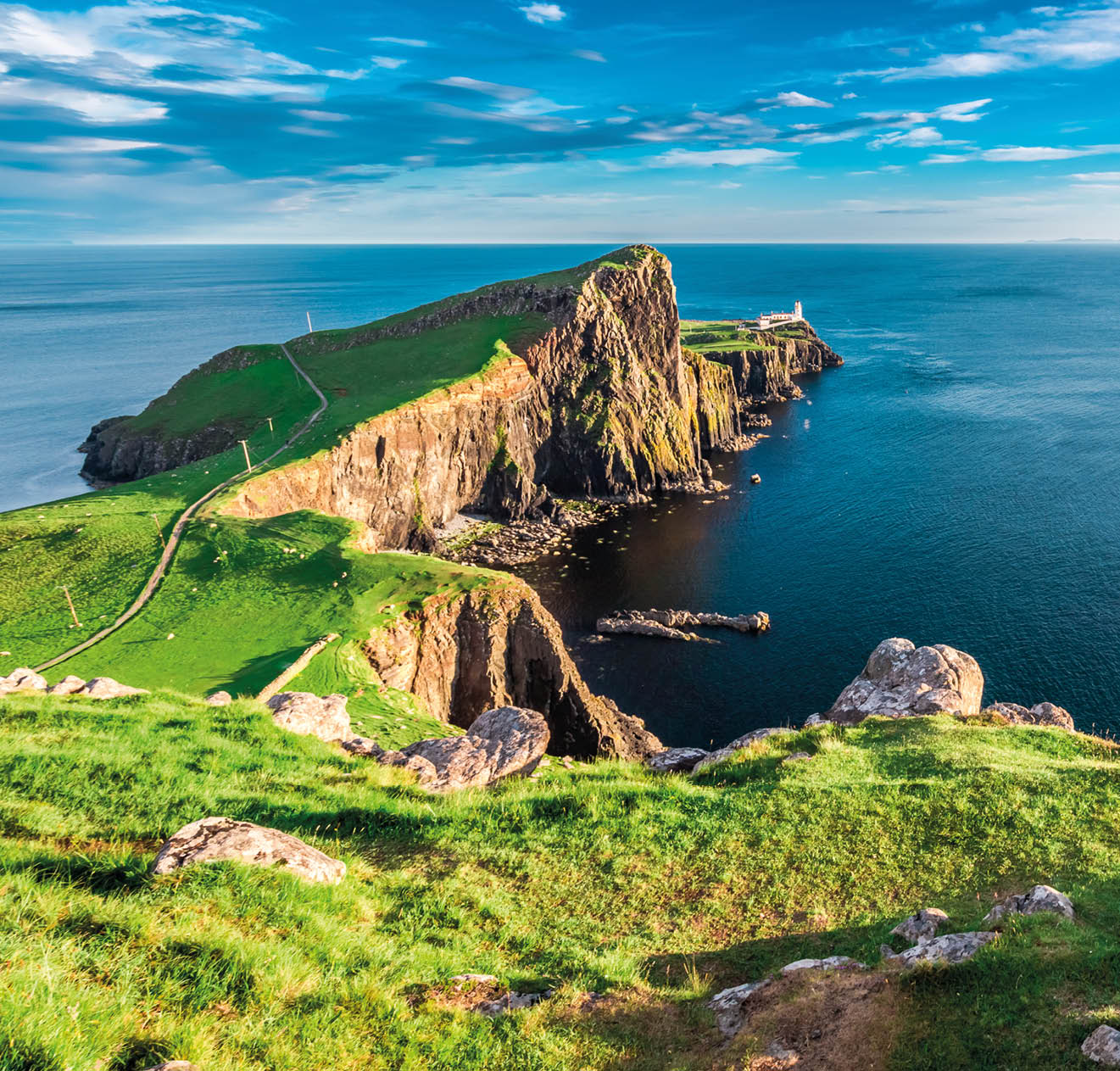 Stunning dusk at the Neist point lighthouse in Isle of Skye, Scotland
